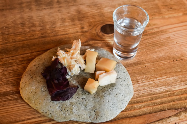 Serving Fermented Shark in Iceland