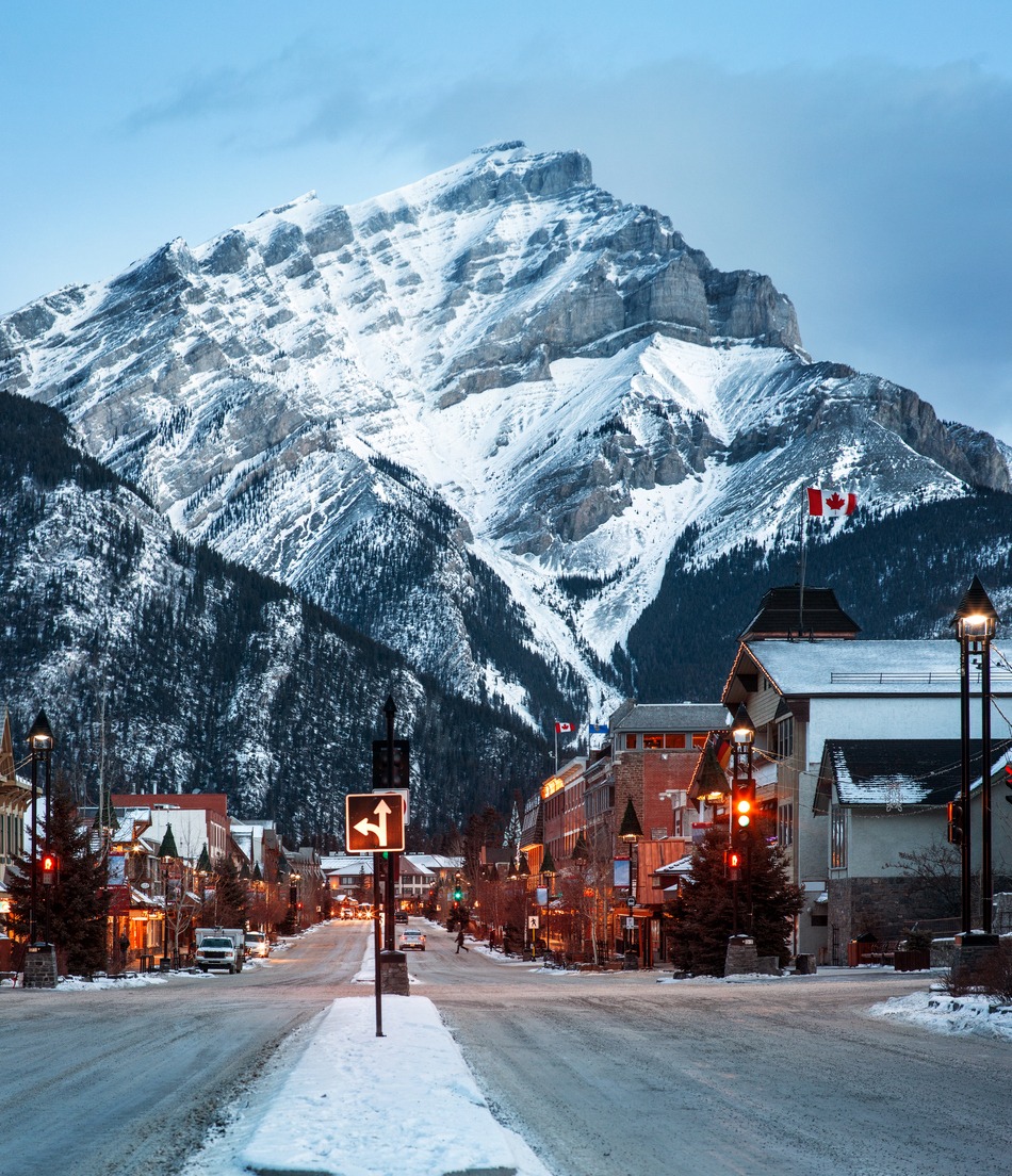 A twilight view of Mount Norquay from Banff Avenue in Banff, Alberta, Canada
